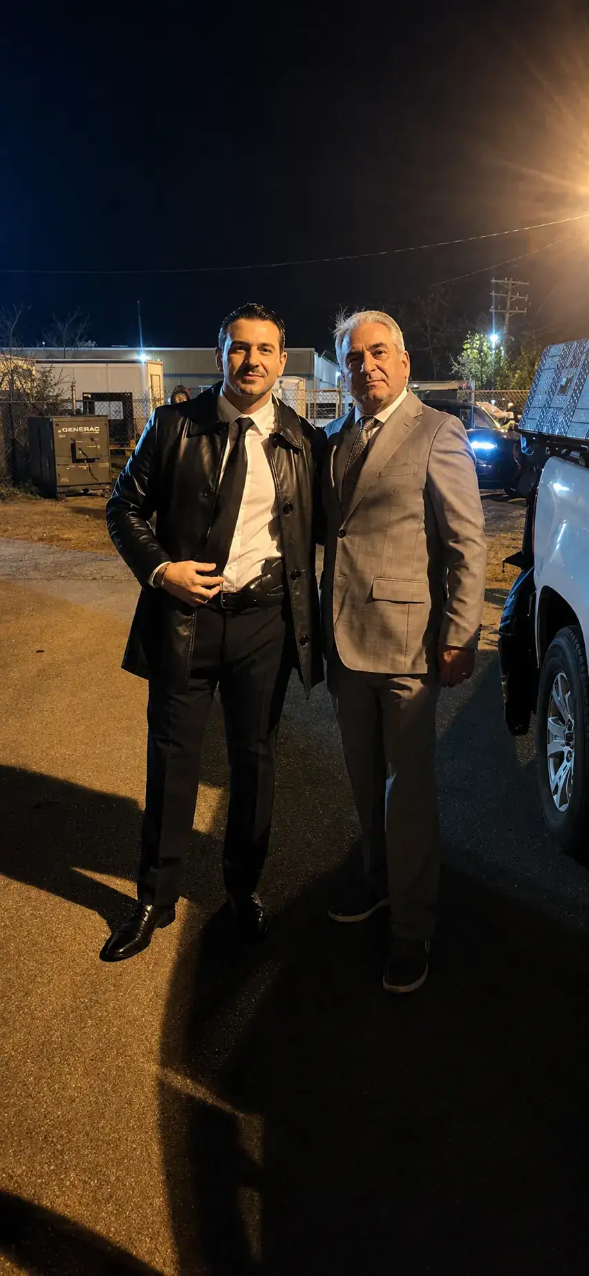 Phil Green with a collaborator on a night location shoot
